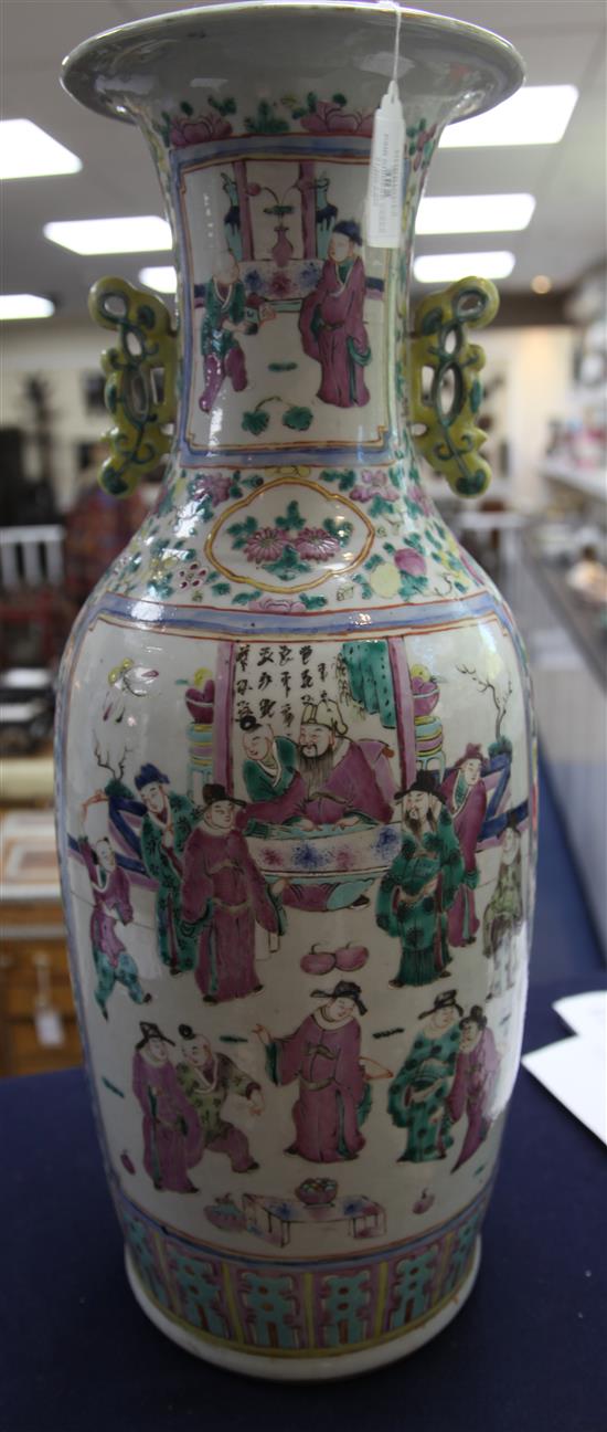 A pair of large Chinese Canton-decorated famille rose two handled baluster vases, late 19th century, height 60.5cm